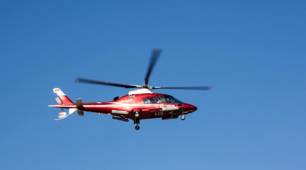 Flying Red and White Helicopter